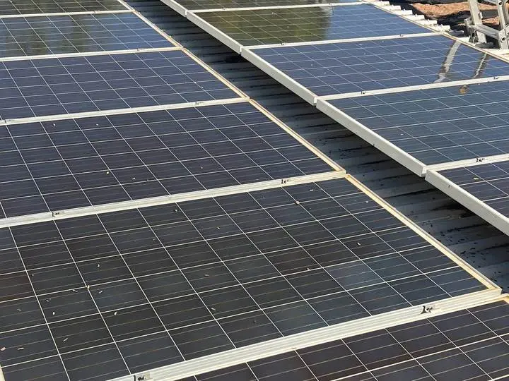 Rows of solar panels on a metal roof after cleaning