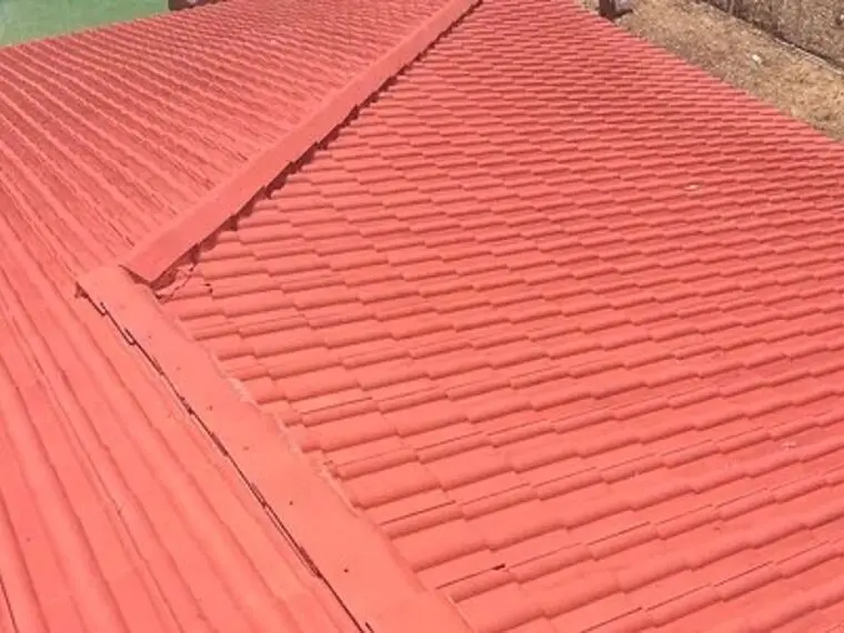 A terracotta tile roof back to clean red after a soft wash