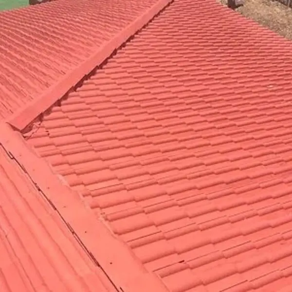 A terracotta tile roof back to full colour after a soft wash